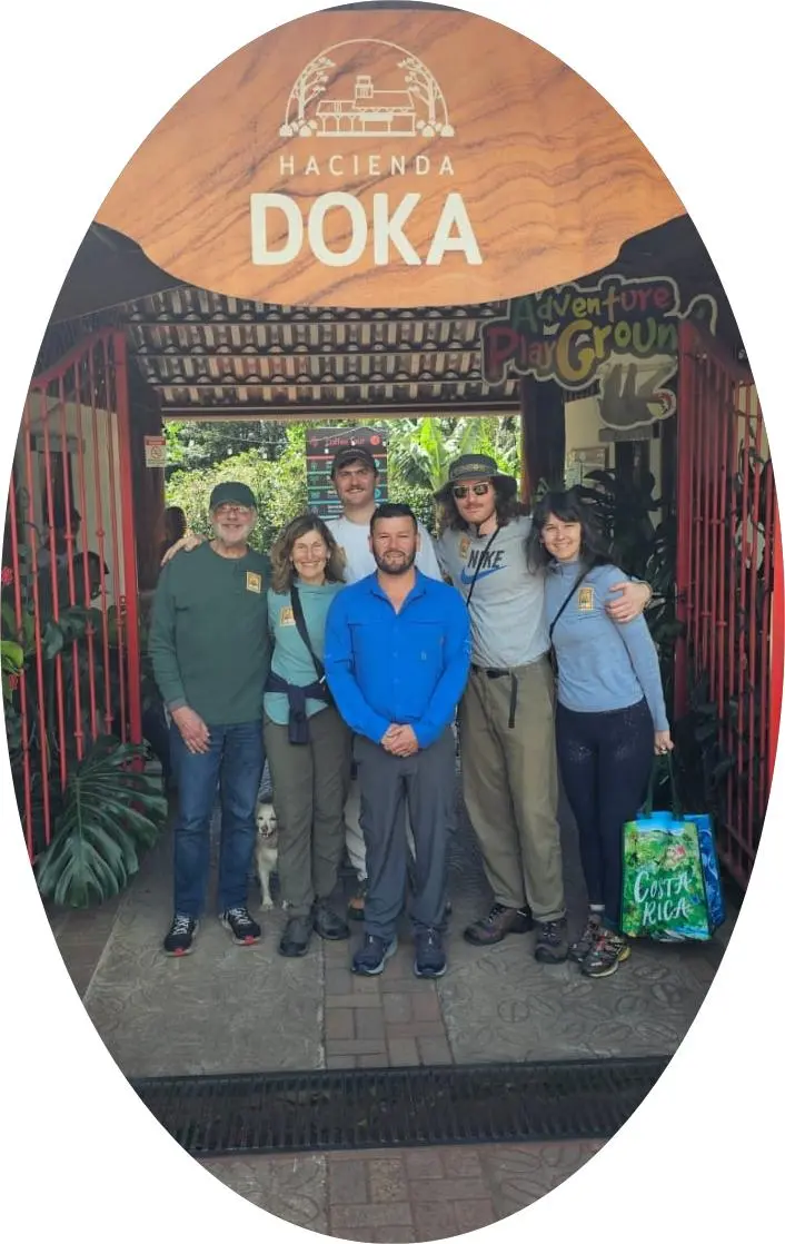 Happy tour group at Doka Coffee Plantation entrance
